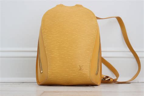 louis vuitton yellow epi backpack|louis vuitton epi elise wallet.